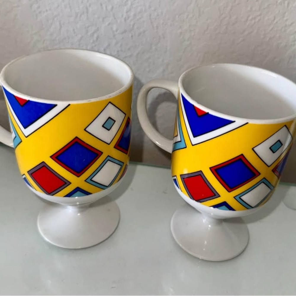 2 Vintage Japan stemmed mugs.